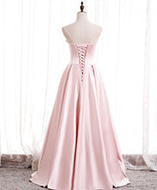 A-Line Strapless Floor-Length Blush Satin Prom Dress with Pleated Overlay and Pearl Tulle Slit