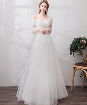 A-Line Ivory Off-the-Shoulder Floor-Length Tulle Prom Dress with Sheer Long Sleeves