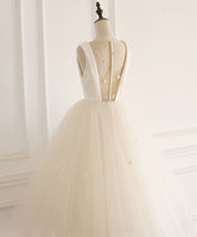 A-Line Bateau Neck Knee-Length Ivory Tulle and Beaded Homecoming Dress with Illusion Back
