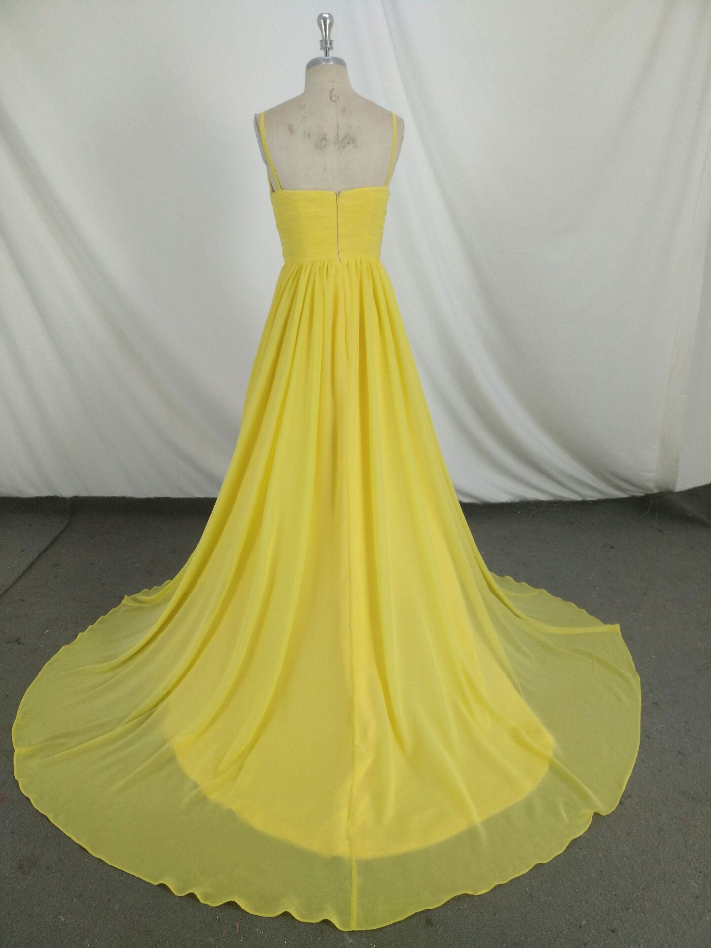 A-Line Spaghetti Straps V-Neck Floor-Length Yellow Chiffon Prom Dress with Ruched Bodice and Flowing Overlay