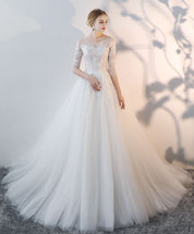 A-Line Illusion Round Neck Lace Wedding Dresses with Long Sleeves Soft Tulle Skirt and Chapel Train