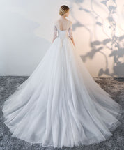 A-Line Illusion Round Neck Lace Wedding Dresses with Long Sleeves Soft Tulle Skirt and Chapel Train