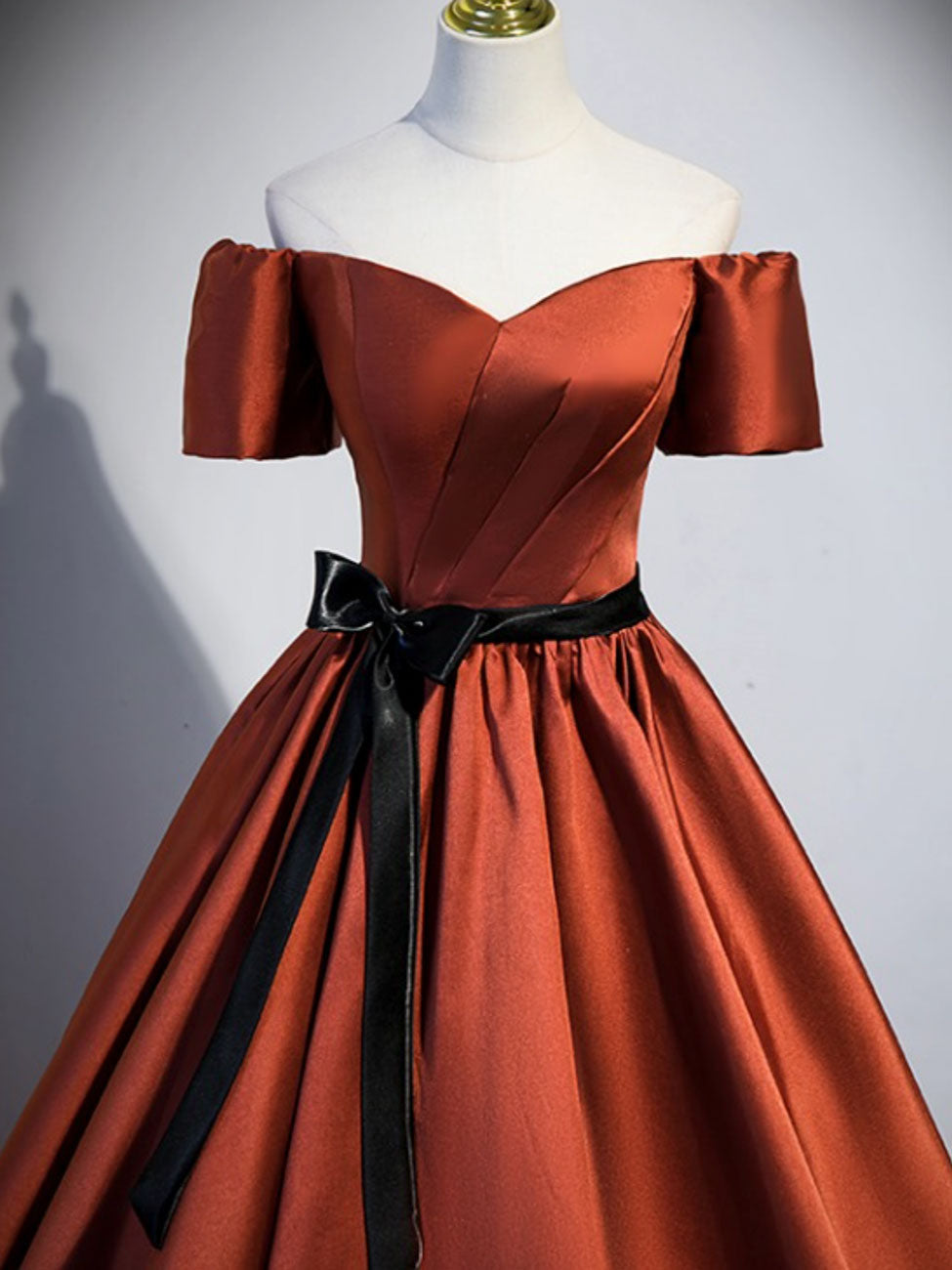 A-Line Off-the-Shoulder Floor-Length Burnt Orange Satin Prom Dress with Contrast Bow Sash