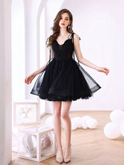 Black A-Line Sweetheart Neck Knee-Length Tulle Homecoming Dress with Sheer Lace-Up Bodice
