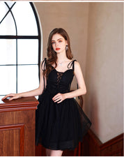Black A-Line Sweetheart Neck Knee-Length Tulle Homecoming Dress with Sheer Lace-Up Bodice