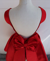 Sleeveless Satin Red Homecoming Dress with Low Back & Oversized Bow Detail